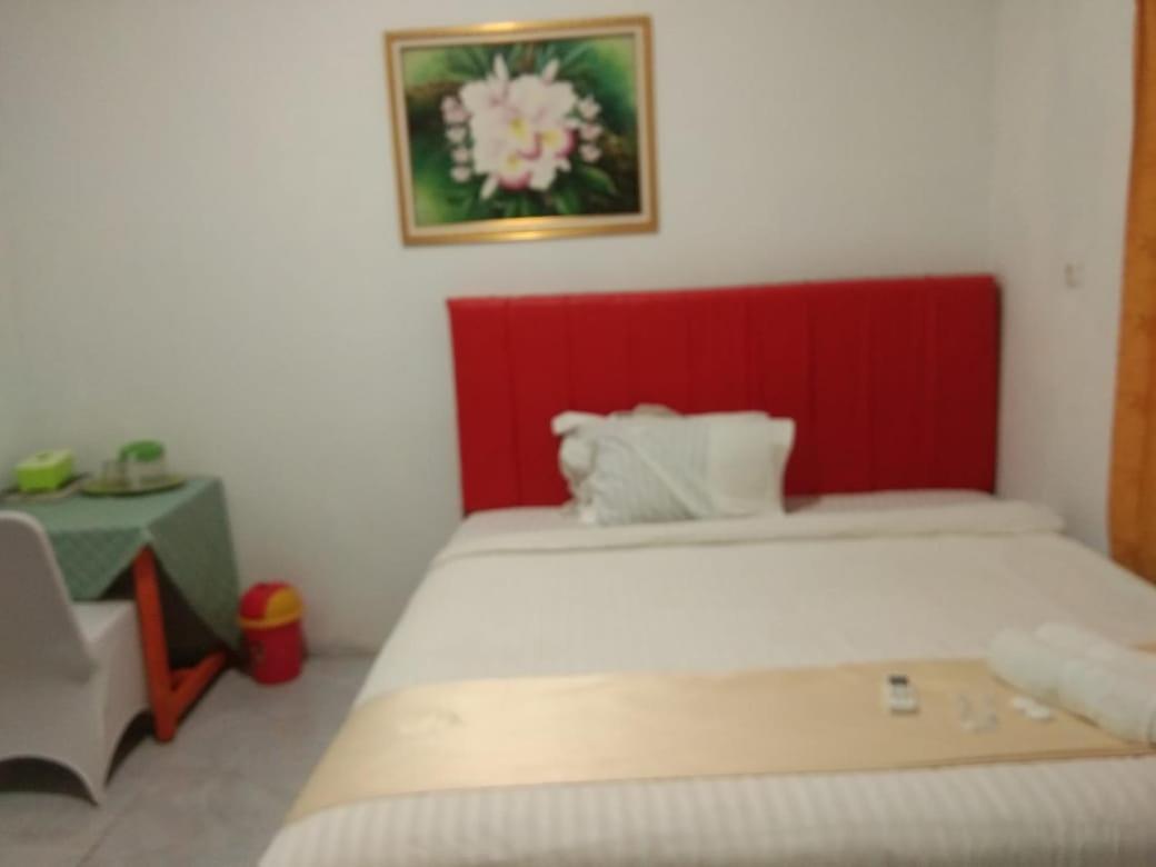 Hotel Krui Syariah Экстерьер фото